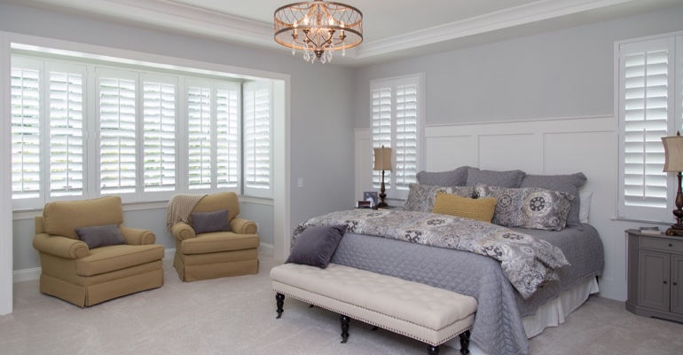 White shutters in Minneapolis bedroom.